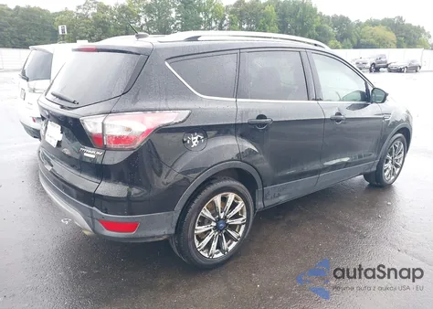 2017 Ford Escape Titanium z USA, uszkodzony, nr VIN 1FMCU0JD9HUA27054
